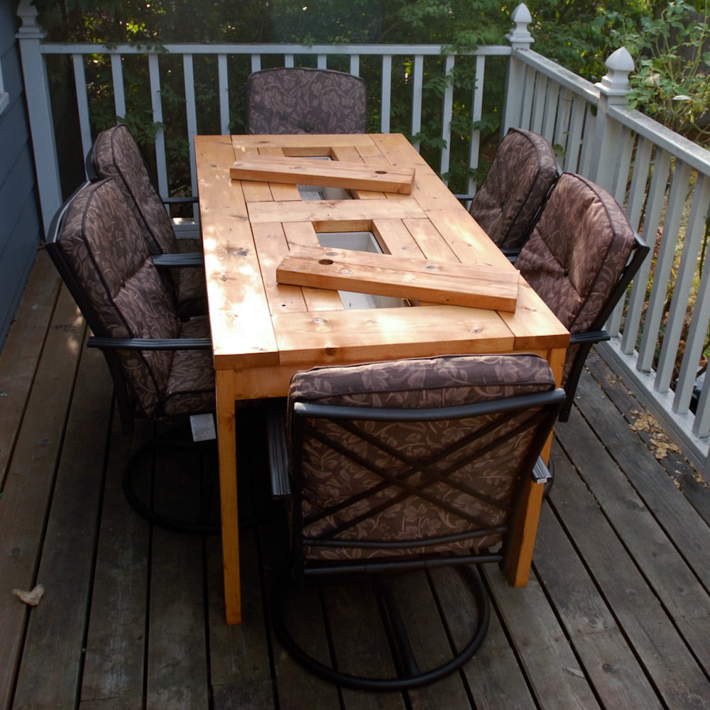 Patio Table with Built-in Beer/Wine Coolers with lids off