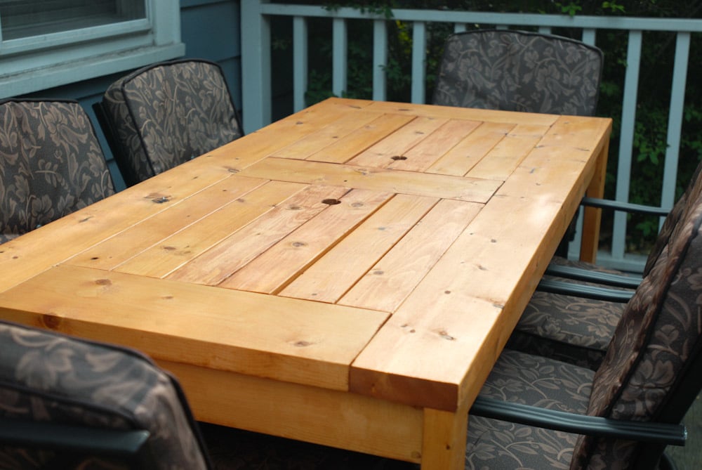 Patio Table with Built-in Beer/Wine Coolers with lids covered