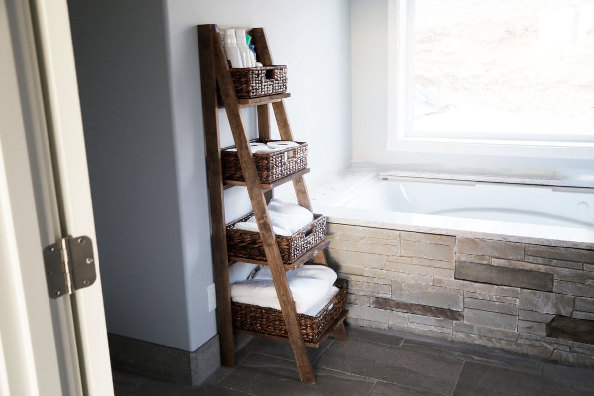 wooden ladder shelf in bathroom