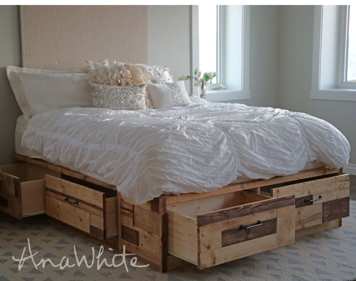 drawers open on reclaimed wood bed