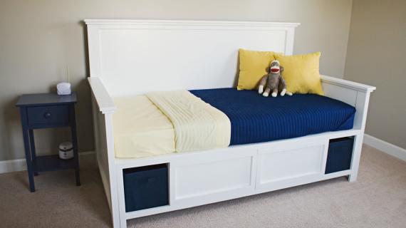 white daybed with storage compartments