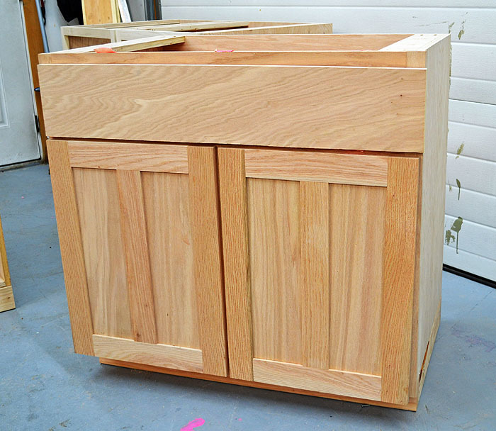 Design-Craft Cabinets  Sink Base Cabinet with Full-Height Doors and  Concealed Apron %