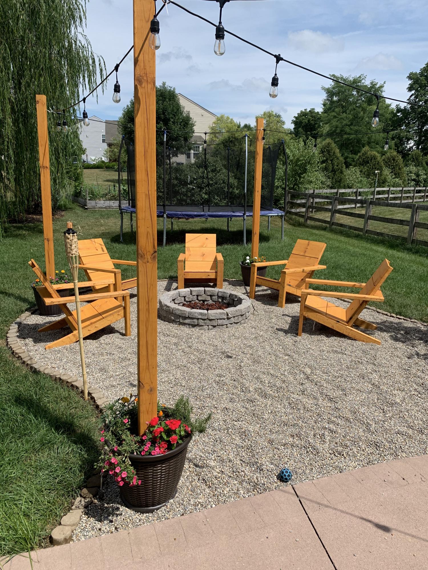 fire pit and adirondack chairs