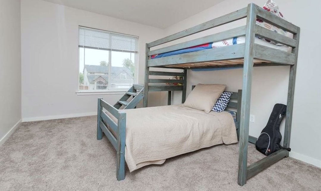 bunk bed with bed underneath