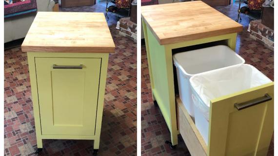 kitchen island with trash bin and seating