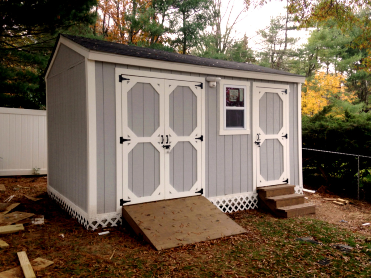 DIY storage shed with mower ramp and steps | Ana White